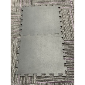 Product image of two interconnecting gym mat tiles slotted together 